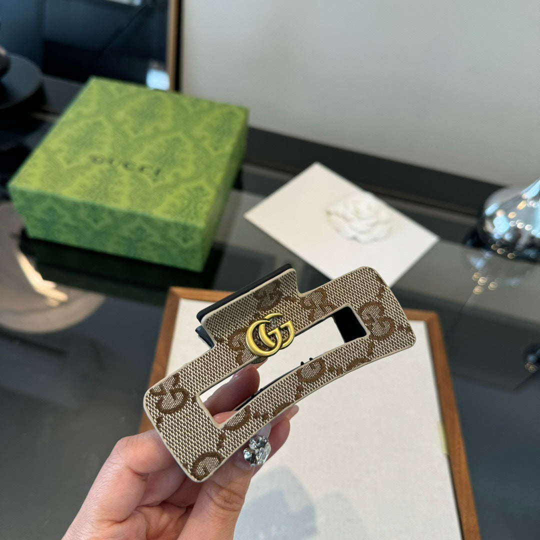 GG Canvas Claw Clip Gold-Tone Hardware 294624