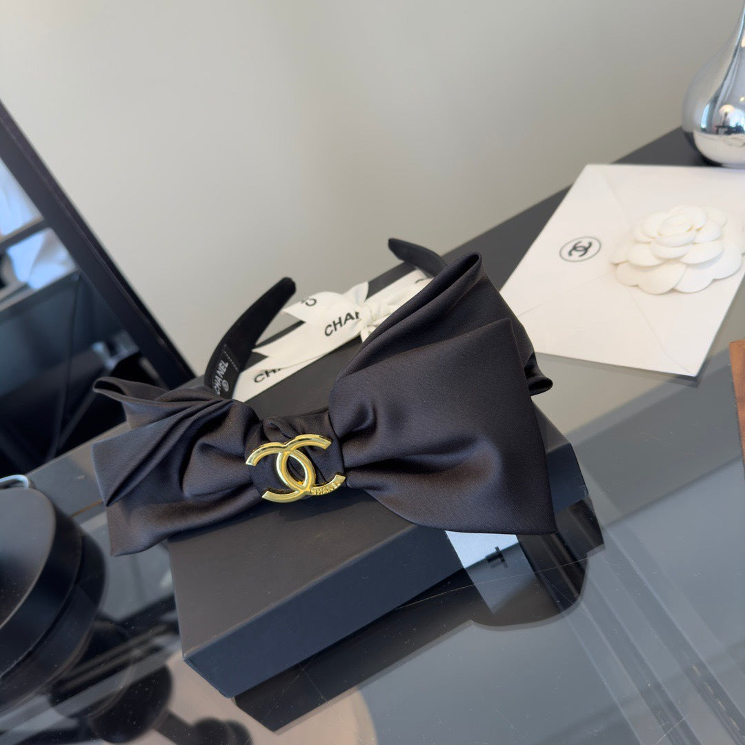 CC 26s Black Bow Headband 275559