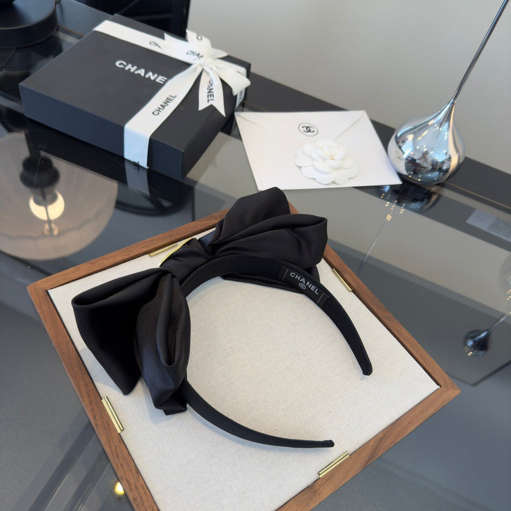 CC 26s Black Bow Headband 275559