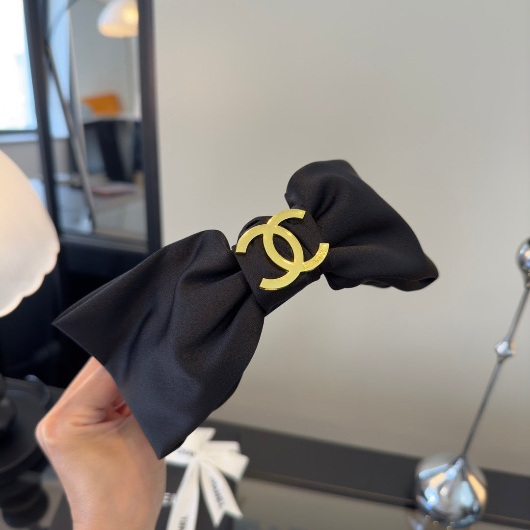 CC 26s Black Bow Headband 275559
