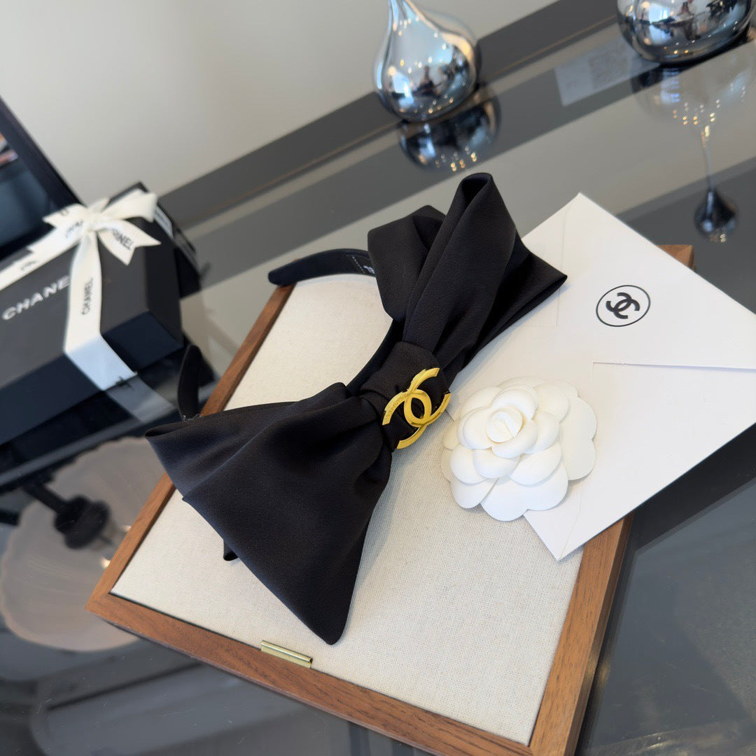 CC 26s Black Bow Headband 275559