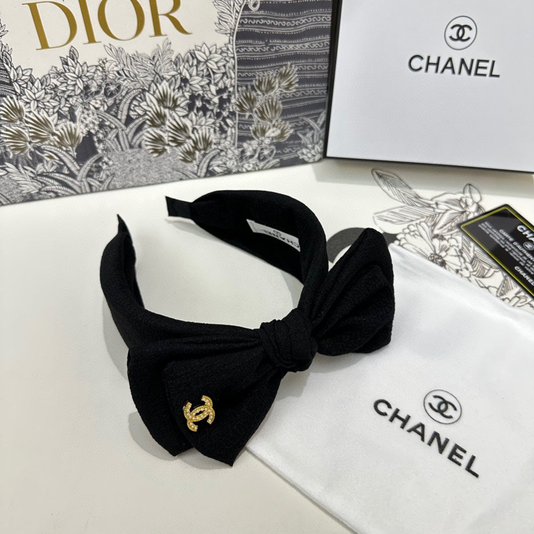BLACK FABRIC HEADBAND WITH BOW 168569